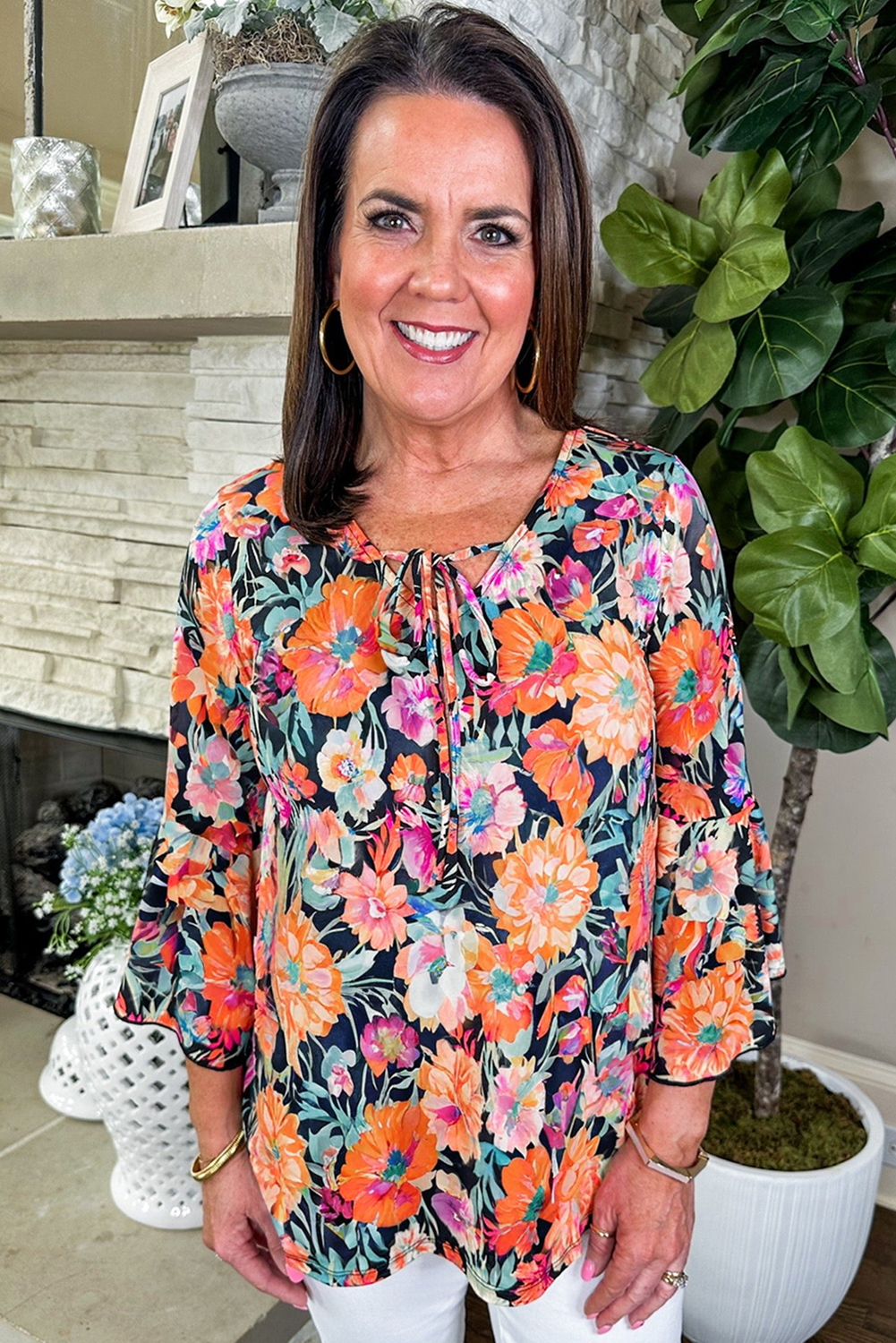 Chic Black Floral Blouse with 3/4 Flare Sleeves and Tied V Neck Design - Detail View 2