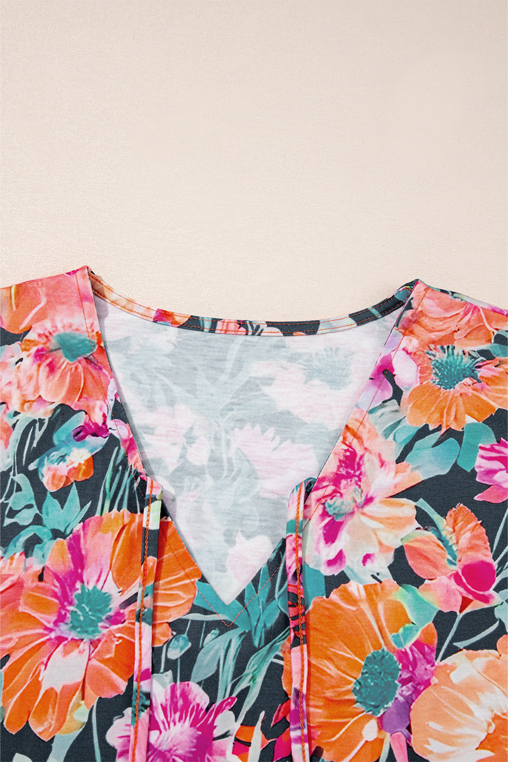 Chic Black Floral Blouse with 3/4 Flare Sleeves and Tied V Neck Design - Detail View 6