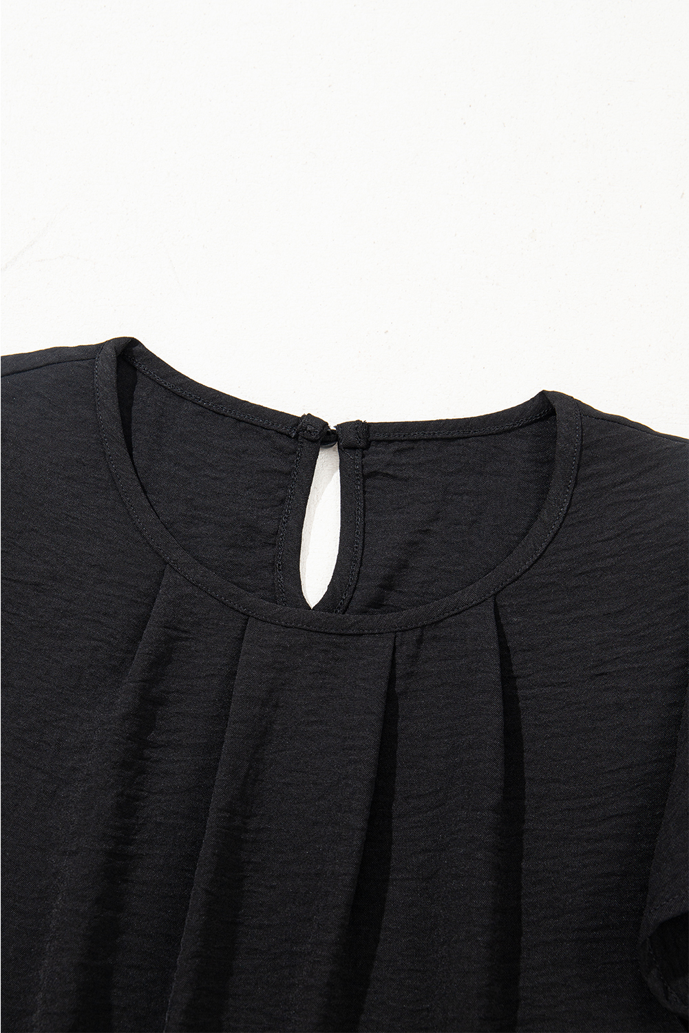 Elegant Short Sleeve Black Blouse with Textured Fabric - Round Neck Design - Detail View 11