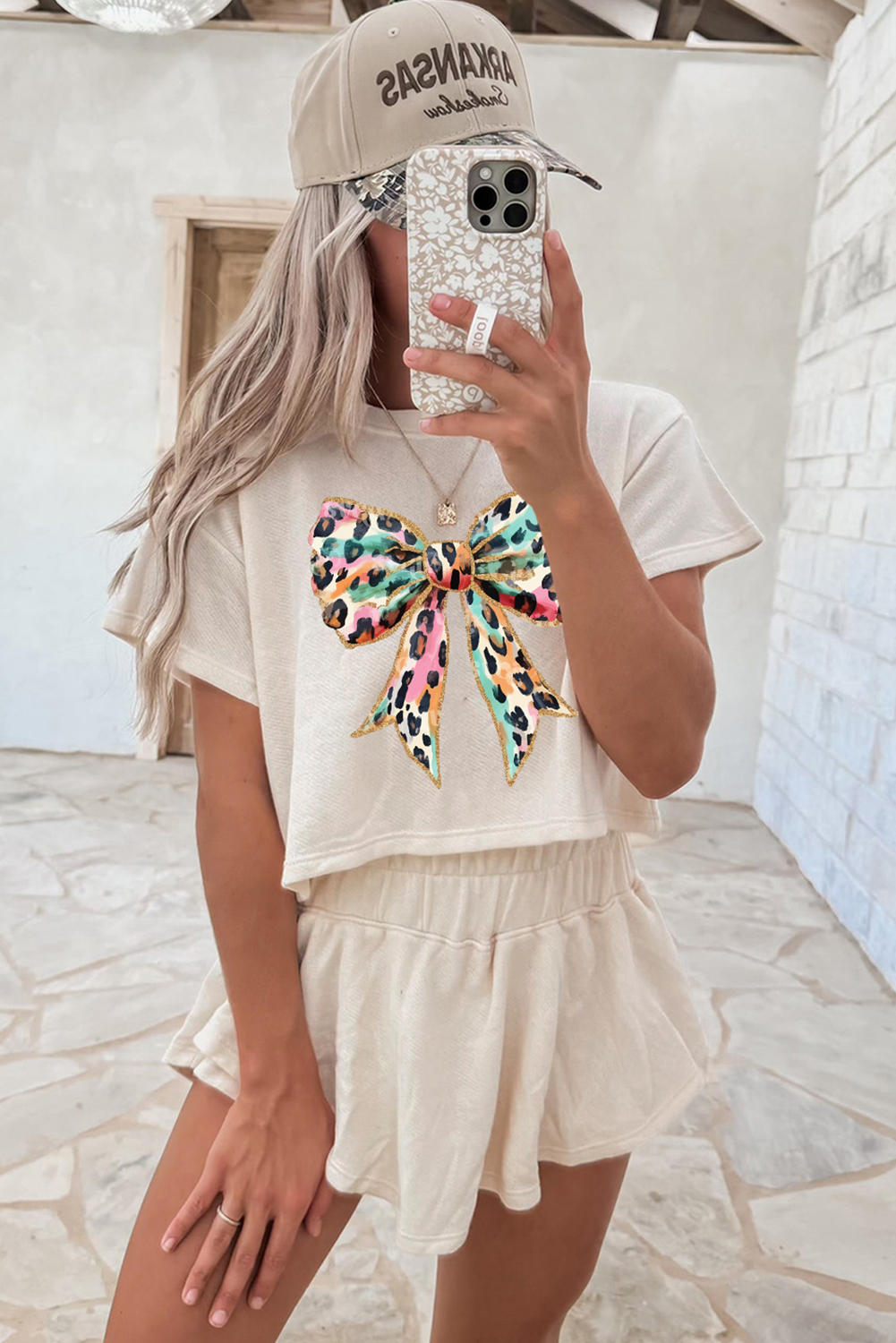 Casual Summer Outfit: Beige Tee with Eye-Catching Bow Print & Matching Skort - Detail View 2