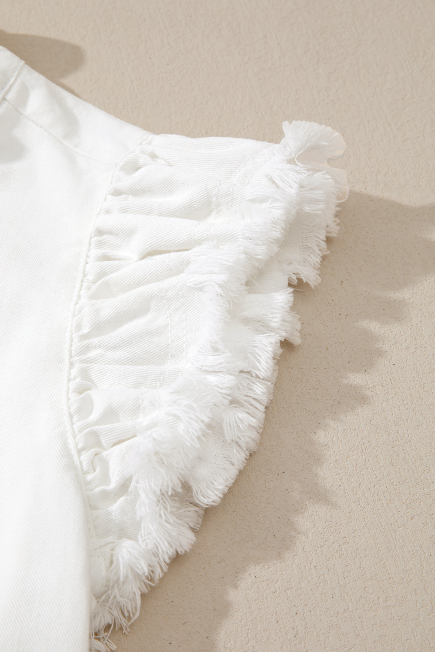 Elegant Women's Sleeveless Denim Top – White Round Neck Blouse with Flutter Sleeves for Summer Outfits - Detail View 9