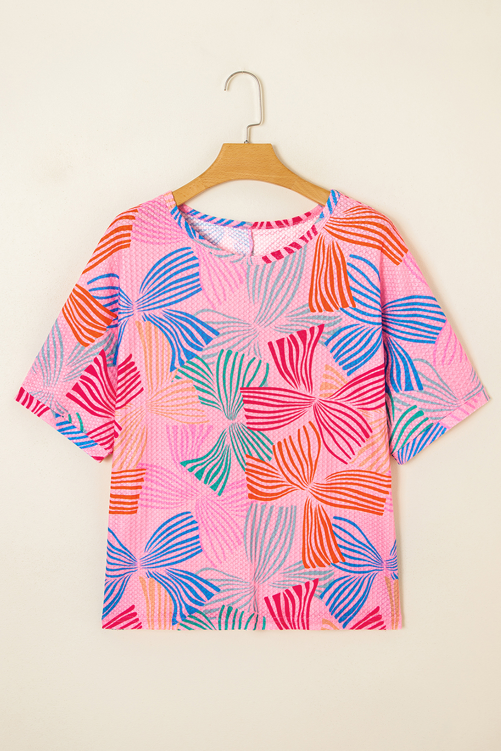 Stylish and Comfy Loose Fit Pink Waffle Knit T-Shirt with Bowknot Design - Detail View 6