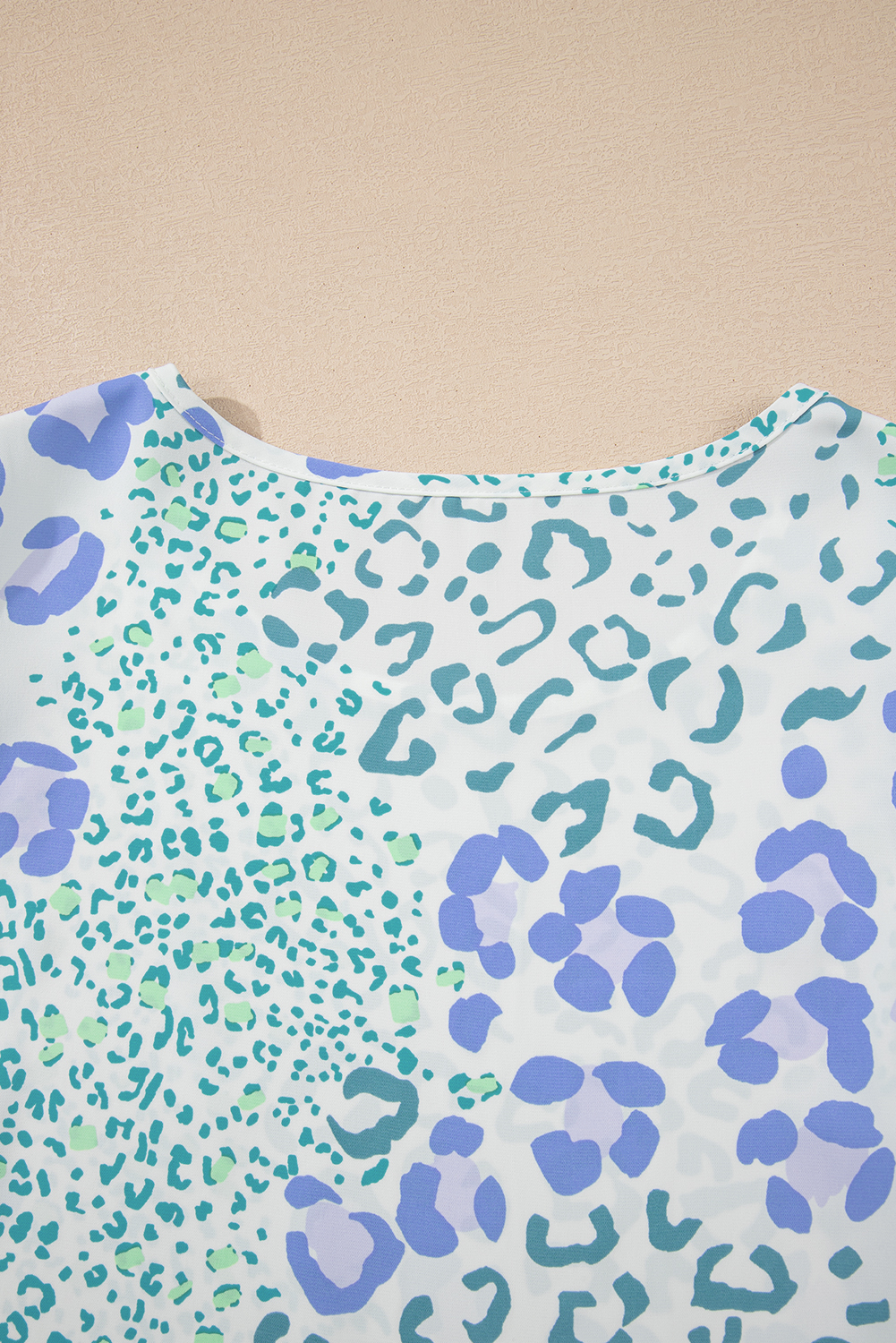 Effortless Summer Look: Sky Blue Leopard Layered Ruffle Short Sleeve Blouse - Detail View 7