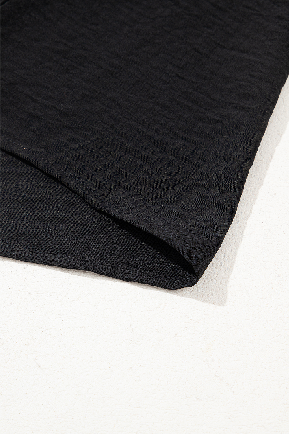 Elegant Short Sleeve Black Blouse with Textured Fabric - Round Neck Design - Detail View 15