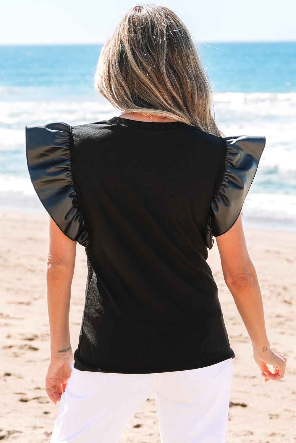 Edgy Black Round Neck T-Shirt Featuring Checkered Letter Print and Ruffle Details - Detail View 3