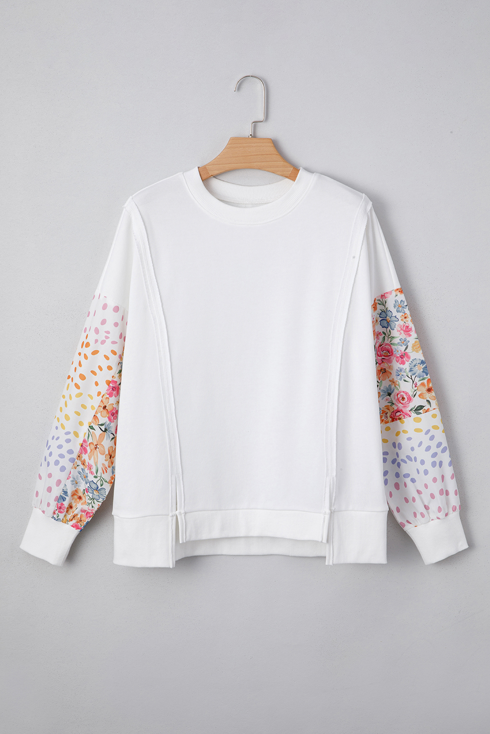 Trendy High Low Sweatshirt with Floral Dotted Patchwork Sleeves for a Chic Look - Detail View 6