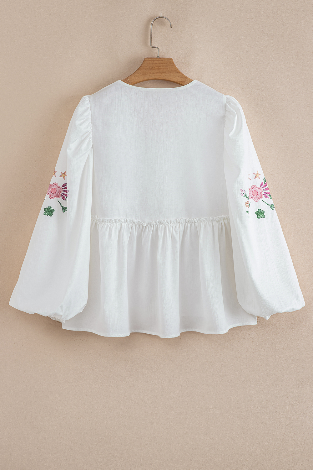 Chic Floral Embroidered Babydoll Top - Flowy Fit with Tassel Detail - Detail View 6