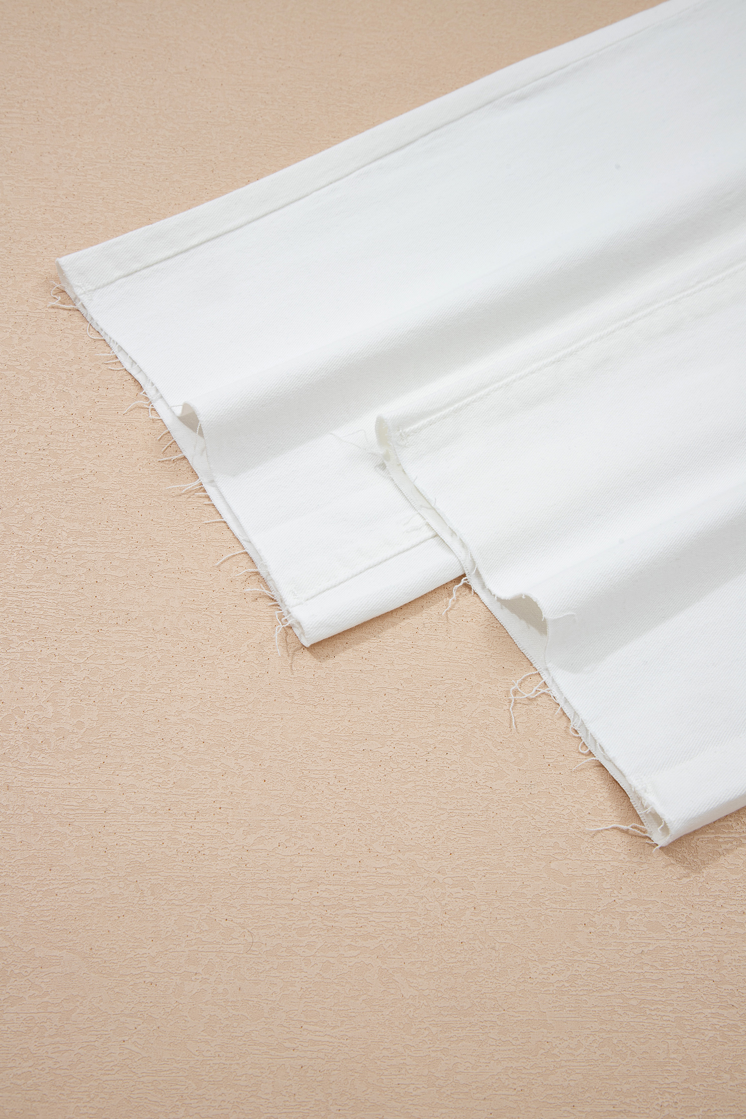 Modern White Denim Trousers, Loose Fit Raw Hem Ankle Jeans - Detail View 9